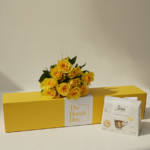 The Yellow Rose Tea Party Pack features ten radiant yellow roses paired with 200g of artisanal Loison Canestrello biscuits. Presented in a color-matched signature yellow gift box, this set offers a professional and spirited gifting solution that blends high-end floristry with the heritage of premium Italian confectionery. It is a sophisticated way to share a moment of joy and refined taste.