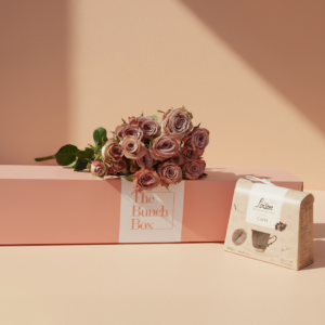 The Caffe Latte Rose Box features five stems of vintage-toned Cappuccino spray roses paired with 200g of artisanal Loison Caffe biscuits. Housed in our signature long-form gift box, this set offers a refined and modern gifting experience that blends unique botanical beauty with the rich, heritage flavors of traditional Italian coffee pastry. It is an ideal choice for corporate gratitude or a sophisticated personal gesture.